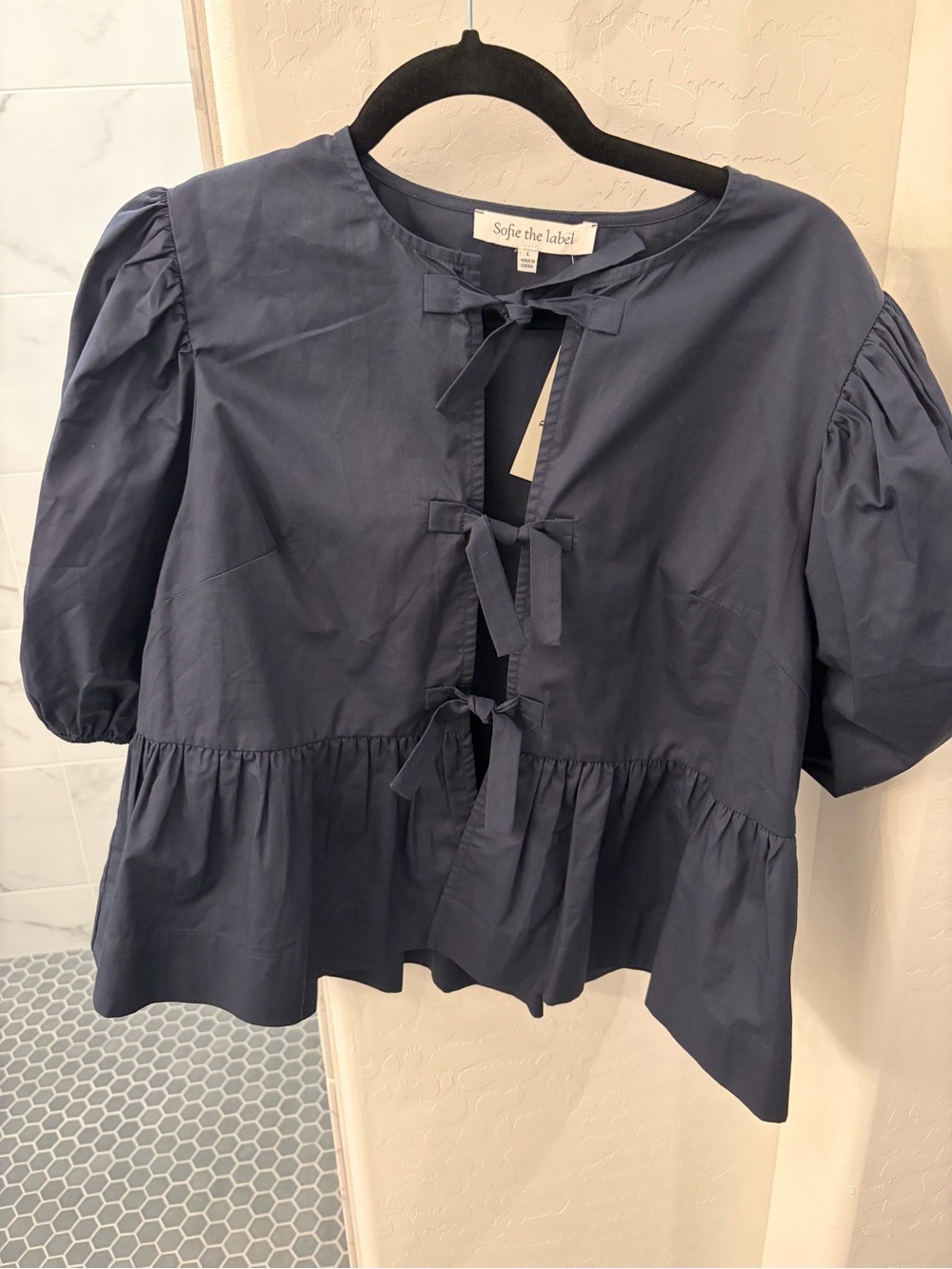 Sofie the Label Navy Puff-Sleeve Tie-Front Peplum Blouse